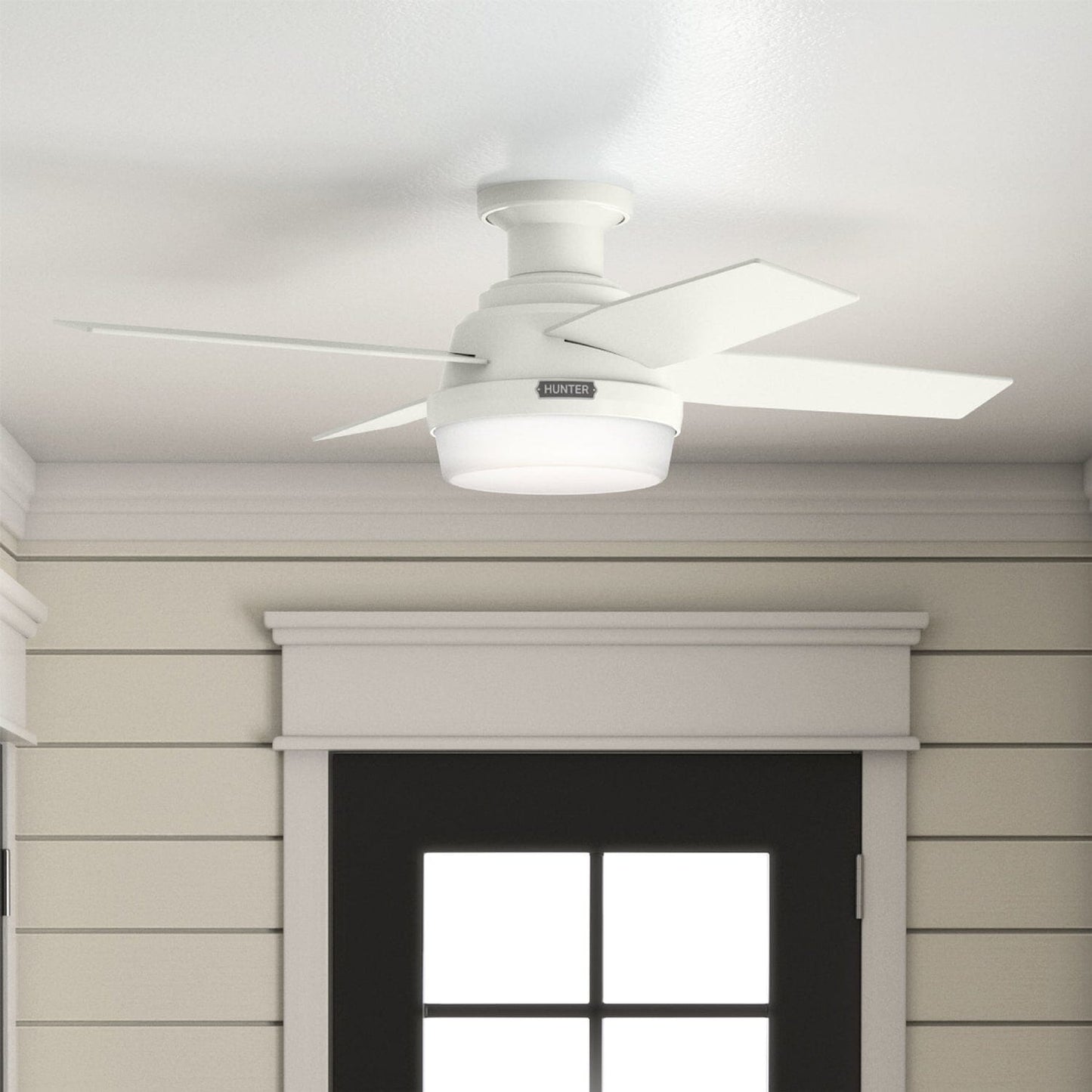 Hunter Dempsey 59244 fan mounted on the ceiling above a door